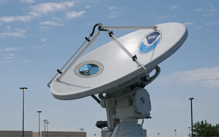 A large concave white disc with the NOAA logo on it.